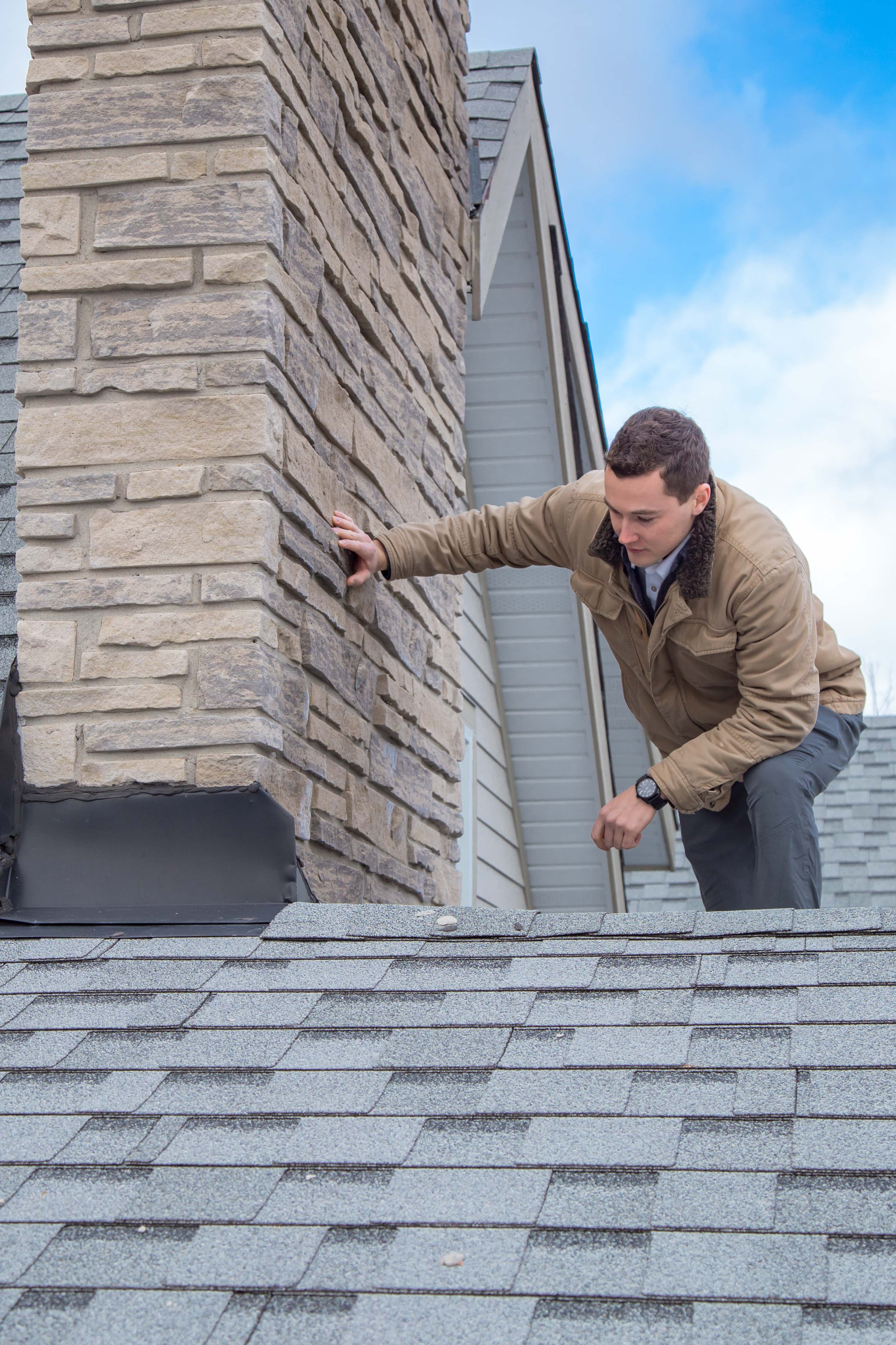 A professional performing a home inspection in Brantford